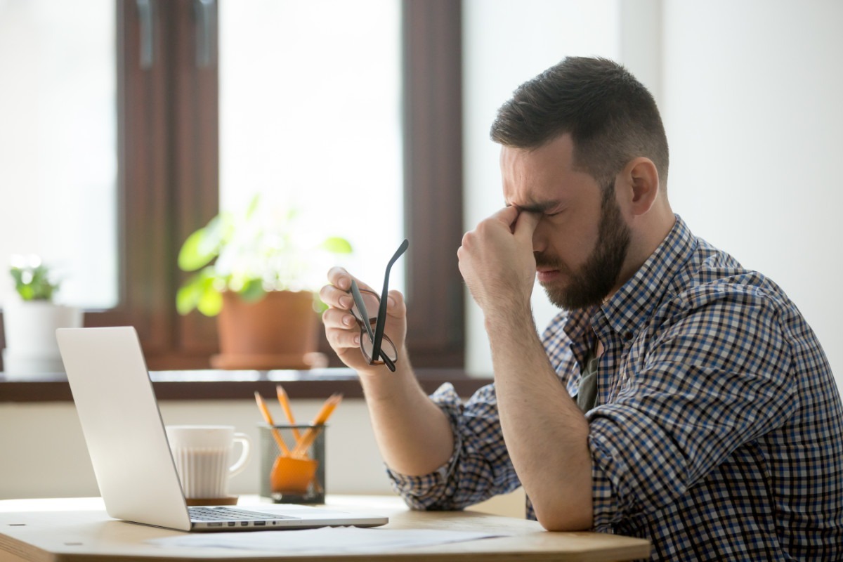 Person checking a credit report and mortgage options despite credit problems