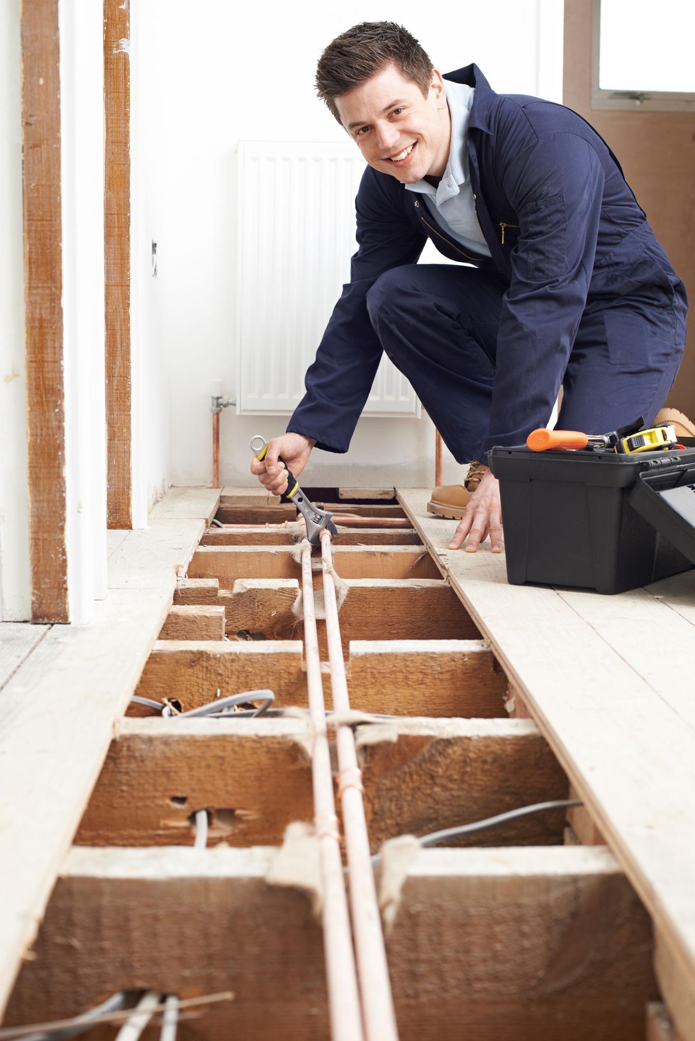 Self-employed tradesperson working in a property